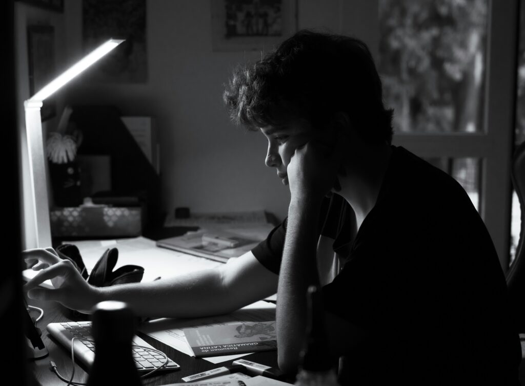 worried person desk night